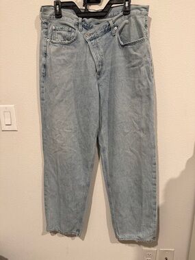 AGOLDE Criss Cross light wash denim jeans